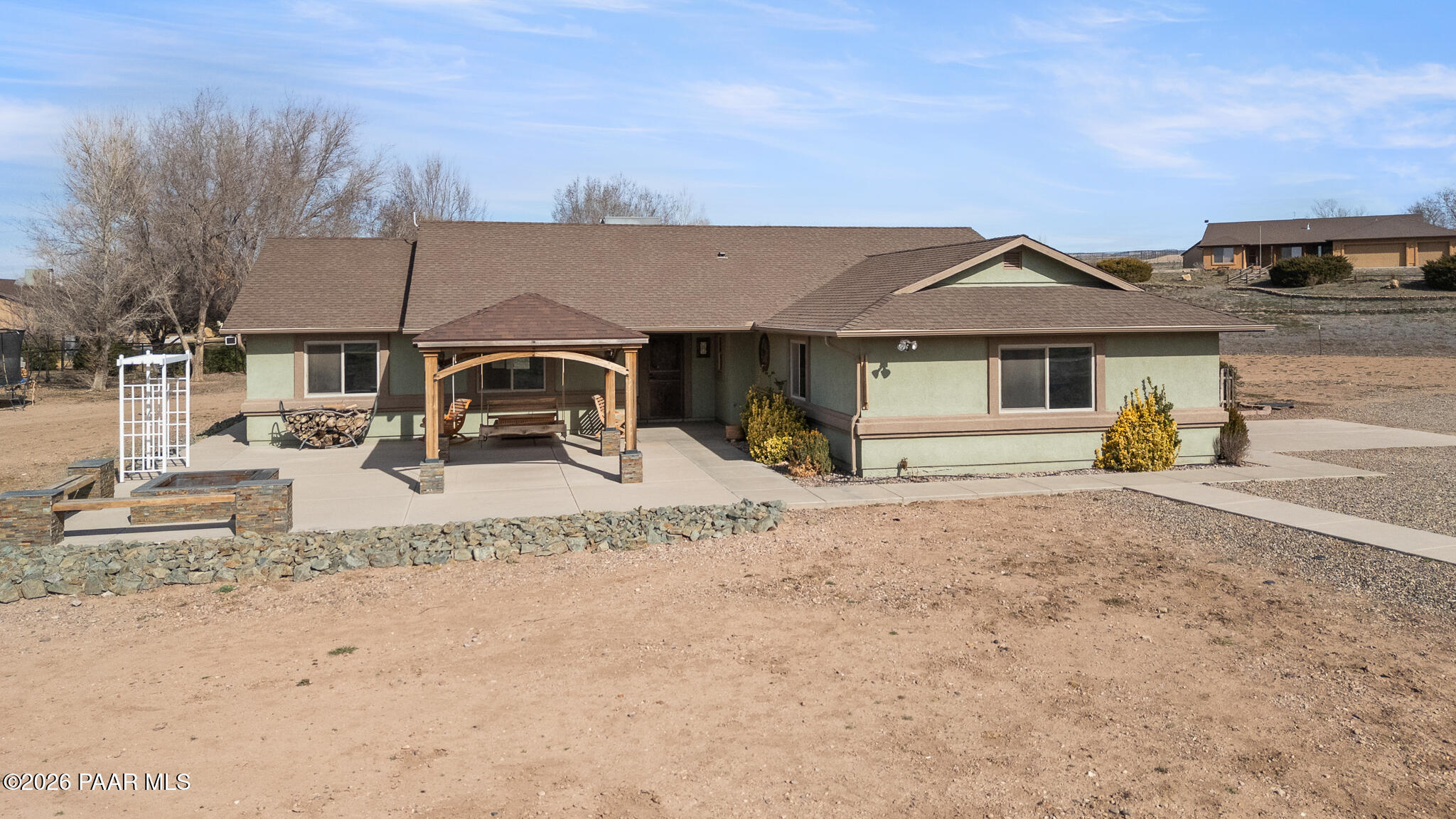 25820 Merlot Lane Paulden, AZ 86334 - Photo 32 of 55 a front view of a house with a yard