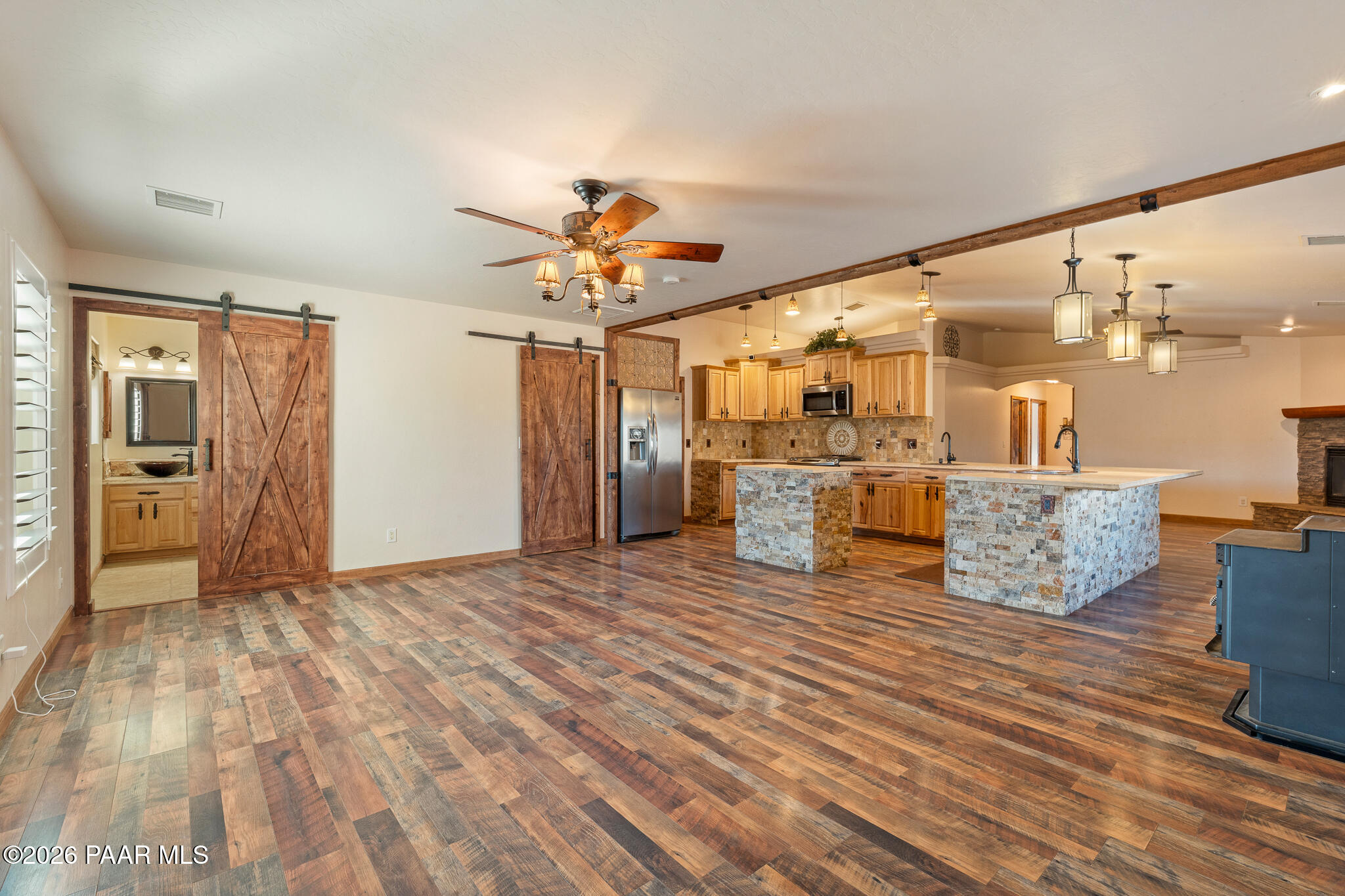 25820 Merlot Lane Paulden, AZ 86334 - Photo 4 of 55 a view of a livingroom with a furniture wooden floor and a kitchen