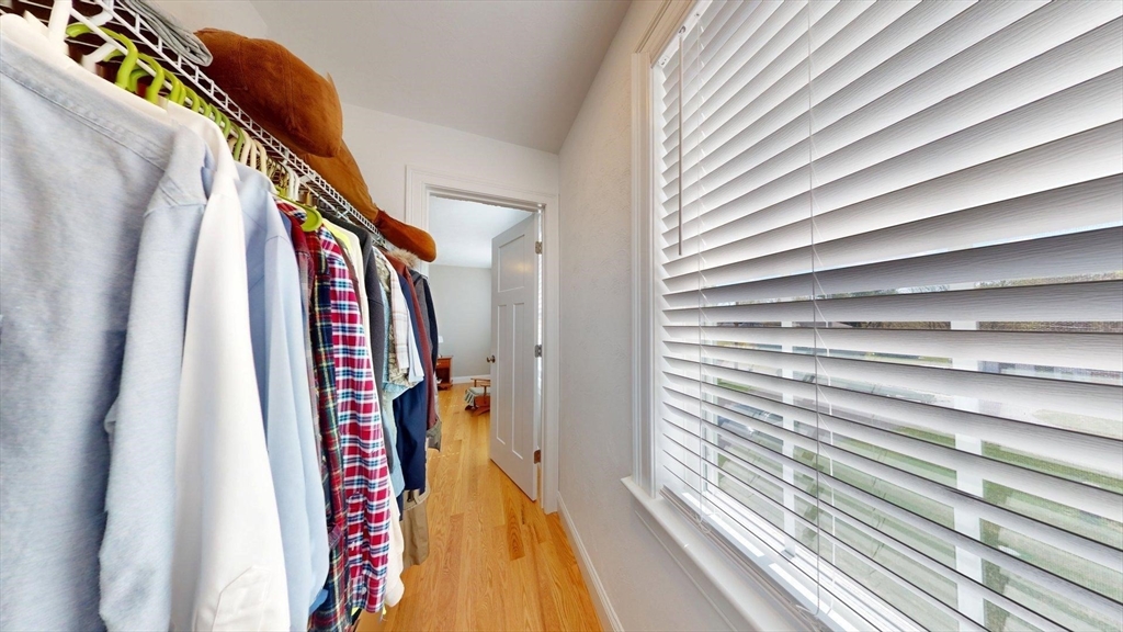 287 Wareham Street Middleboro, MA 02346 - Photo 13 of 28 a view of walk in closet with clothes and shoes