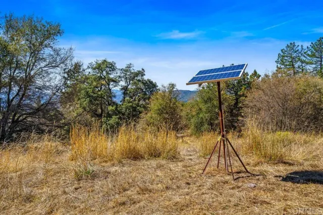 a view of lake with green space