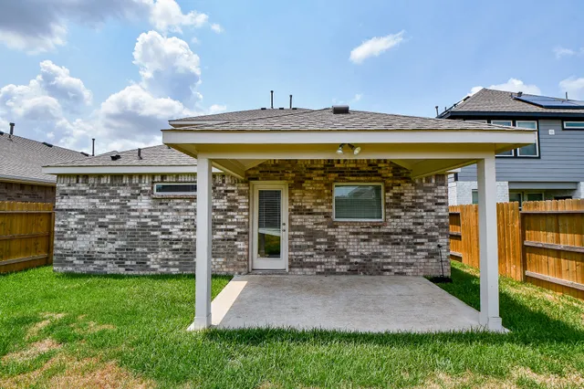 a view of a backyard with a garden