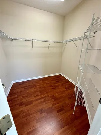 a view of a room with racks on the wall