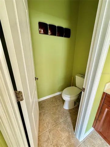 a view of hallway with wooden floor