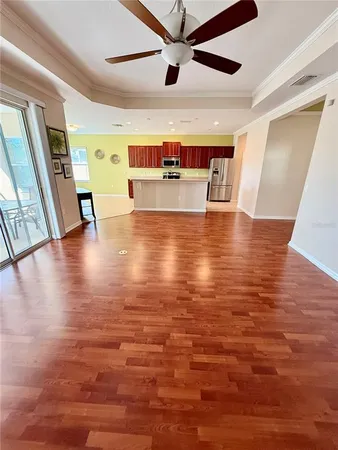a view of a livingroom with wooden floor