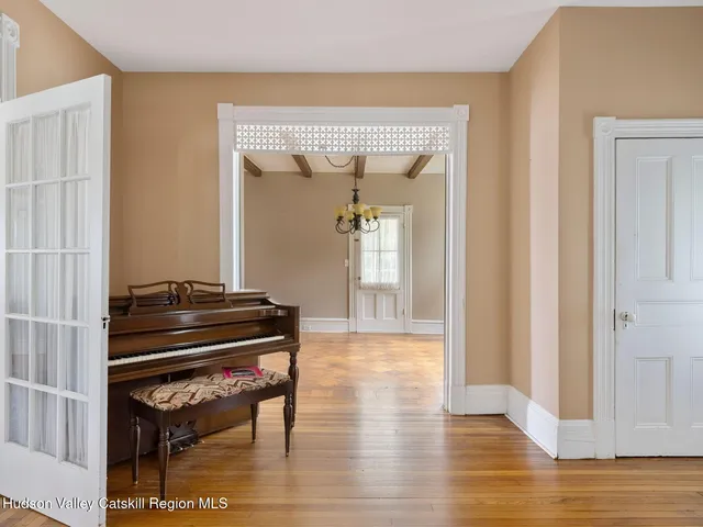 a kitchen with cabinets appliances a sink and a window