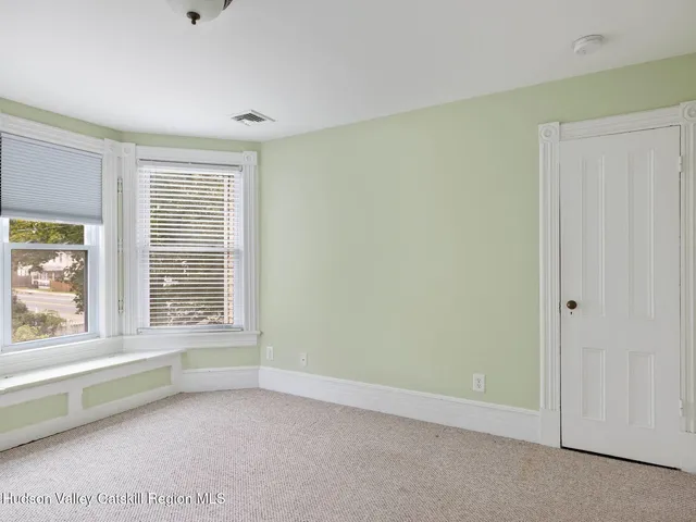 a view of a bathroom with a glass door
