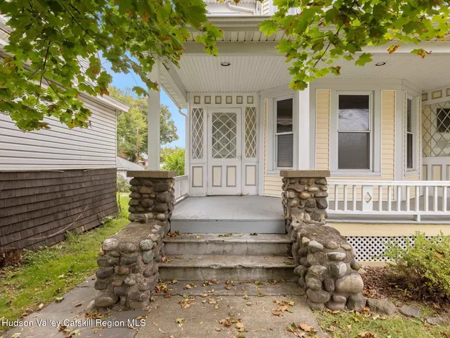 front view of a building with a bench