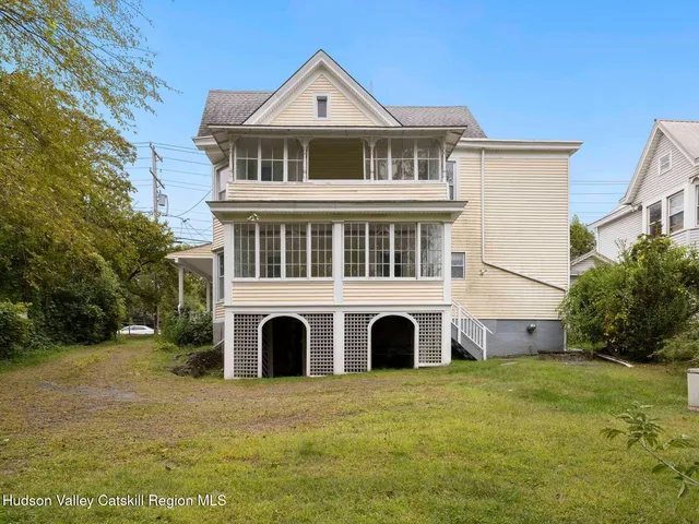 a picture of a bench in a white building