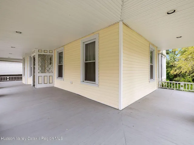 a view of a city street from a balcony