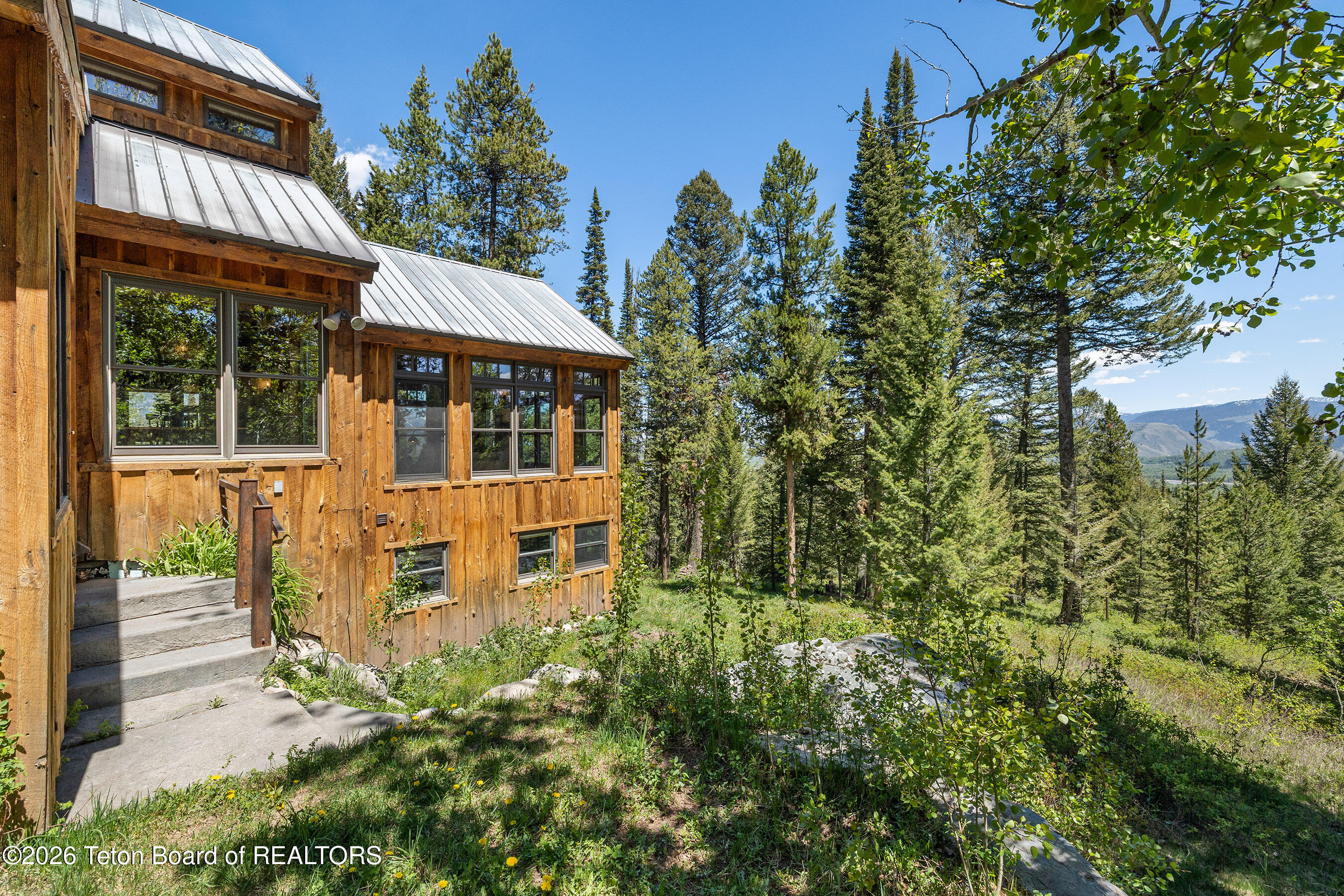 6640 Lupine Trail Wilson, WY 83014 - Photo 34 of 41 Facade Sun Room Steps_email