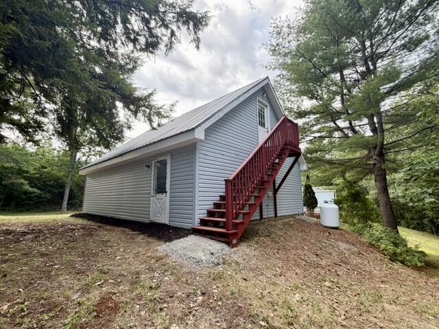 950 China Road Winslow, ME 04901 - Photo 3 of 48 Stairs to open space above garage