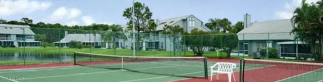 a garden view with a fountain
