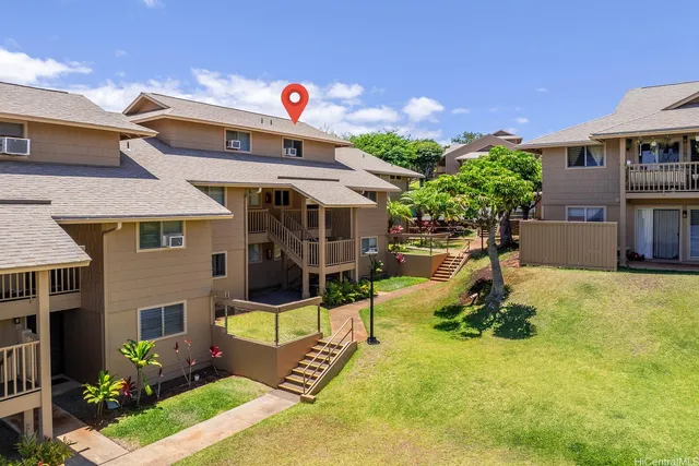 a view of a house with swimming pool