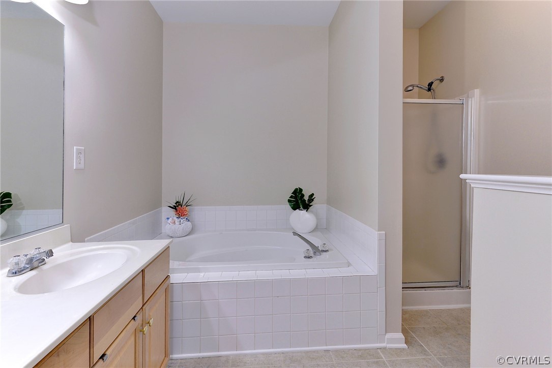 4415 Wind River Run Williamsburg, VA 23188 - Photo 20 of 36 a bathroom with a sink and a bathtub