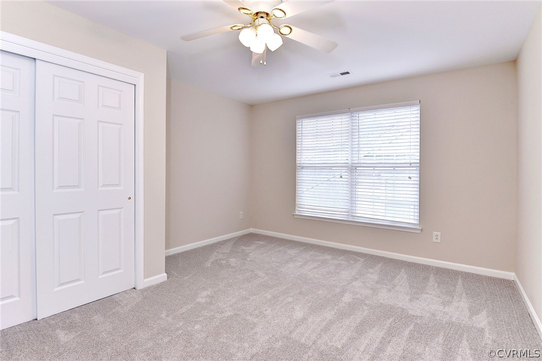 4415 Wind River Run Williamsburg, VA 23188 - Photo 23 of 36 a view of an empty room with a window