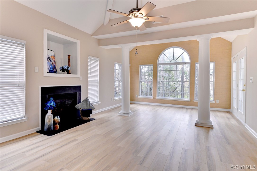 4415 Wind River Run Williamsburg, VA 23188 - Photo 5 of 36 a view of a livingroom with wooden floor and a fireplace