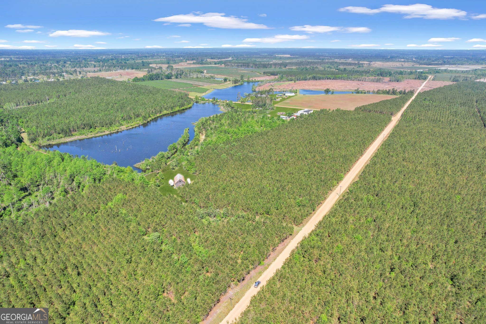 5 Sanderling Road Alma, GA 31510 - Photo 1 of 1 a view of a city and an ocean