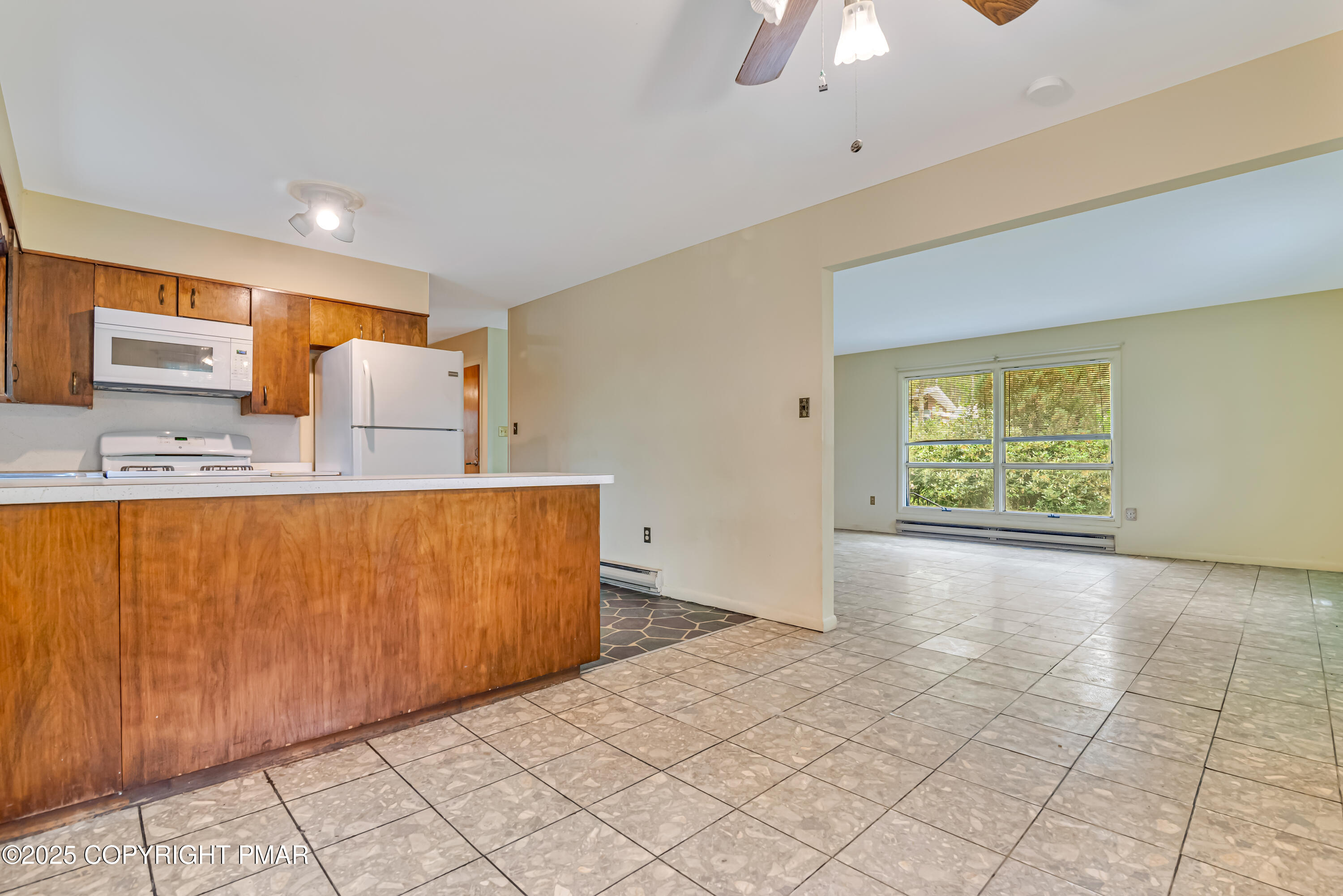129 Winona Road Mount Pocono, PA 18344 - Photo 14 of 64 a view of kitchen with furniture and window