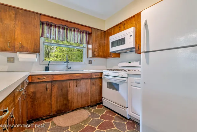 a view of a backyard with garden