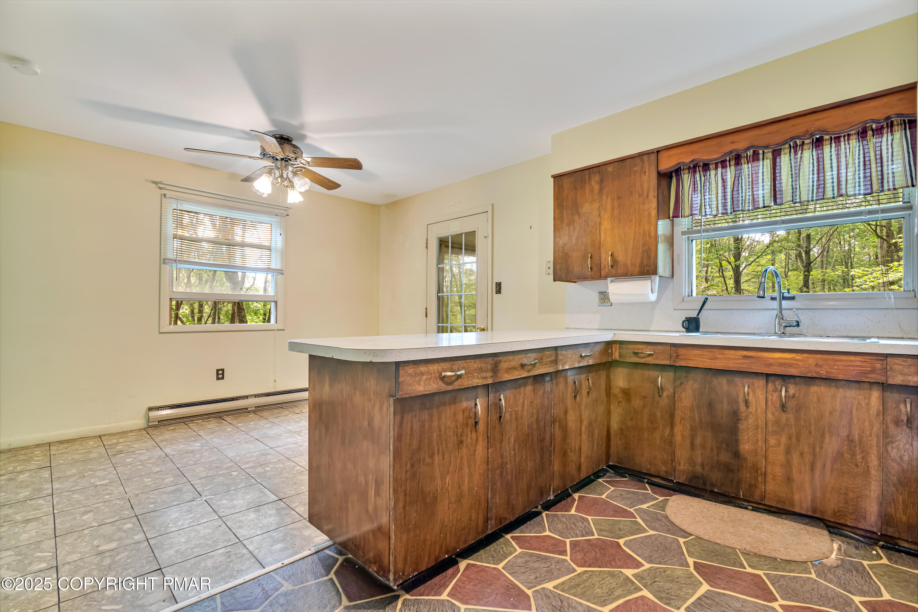 129 Winona Road Mount Pocono, PA 18344 - Photo 19 of 64 a kitchen with stainless steel appliances granite countertop a sink and a cabinets