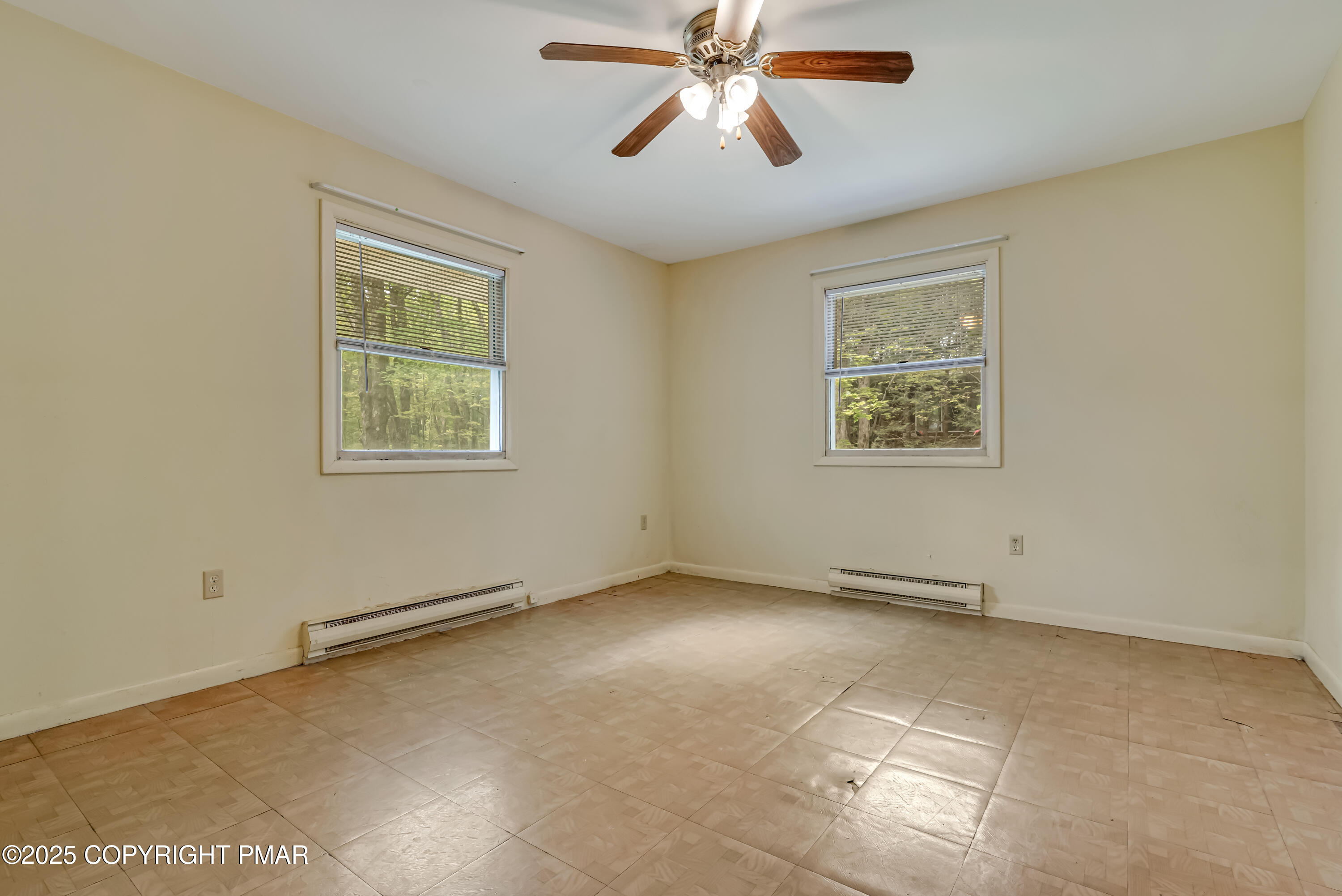 129 Winona Road Mount Pocono, PA 18344 - Photo 24 of 64 a view of an empty room with a window