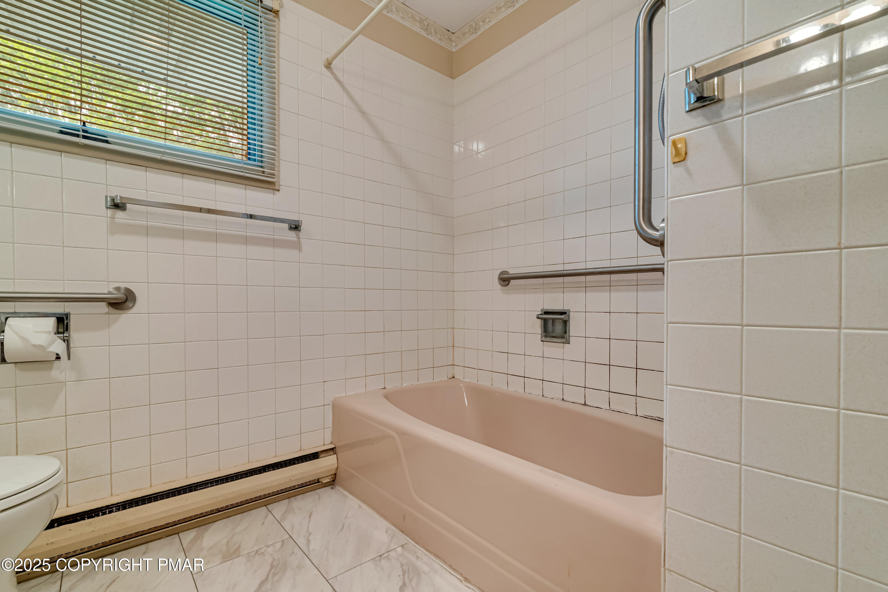 129 Winona Road Mount Pocono, PA 18344 - Photo 32 of 64 a bathroom with a bathtub and shower