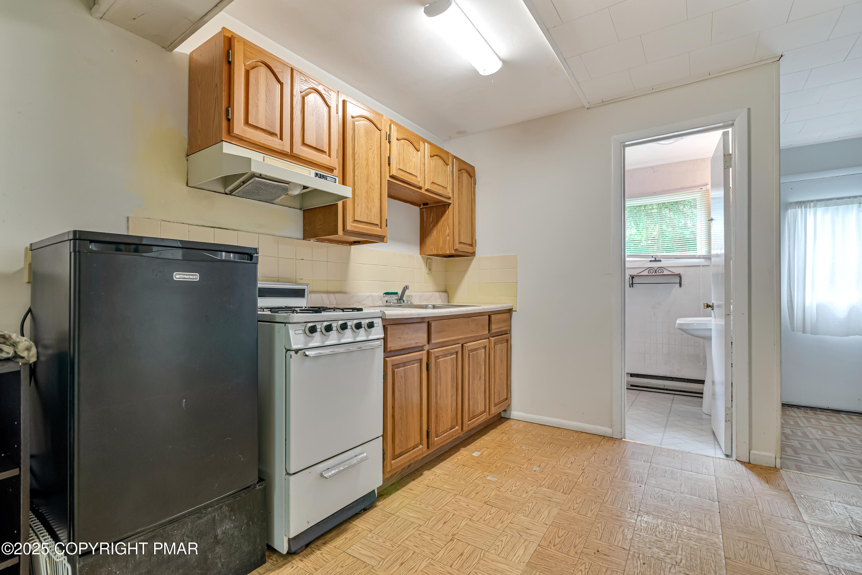 129 Winona Road Mount Pocono, PA 18344 - Photo 35 of 64 a kitchen with stainless steel appliances granite countertop a refrigerator and a stove