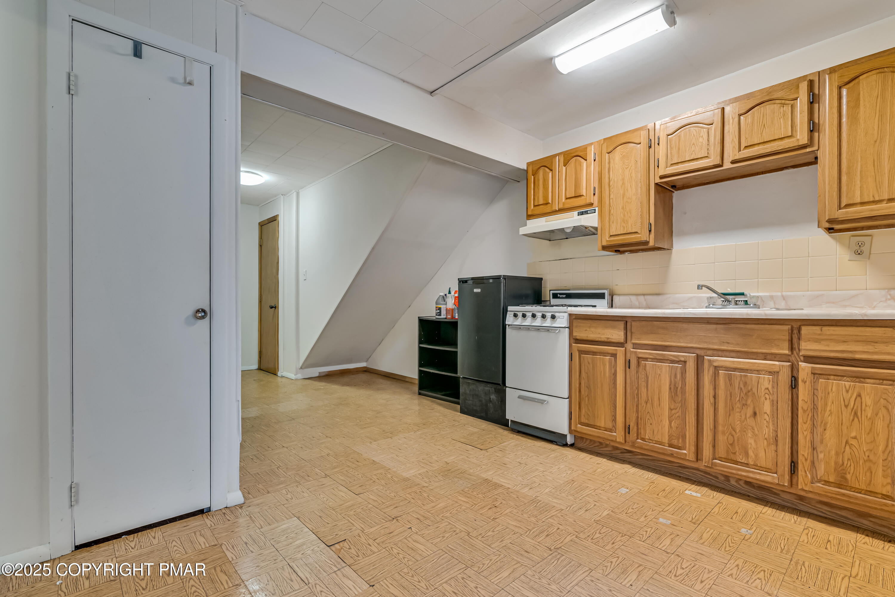 129 Winona Road Mount Pocono, PA 18344 - Photo 37 of 64 a view of a kitchen with cabinets