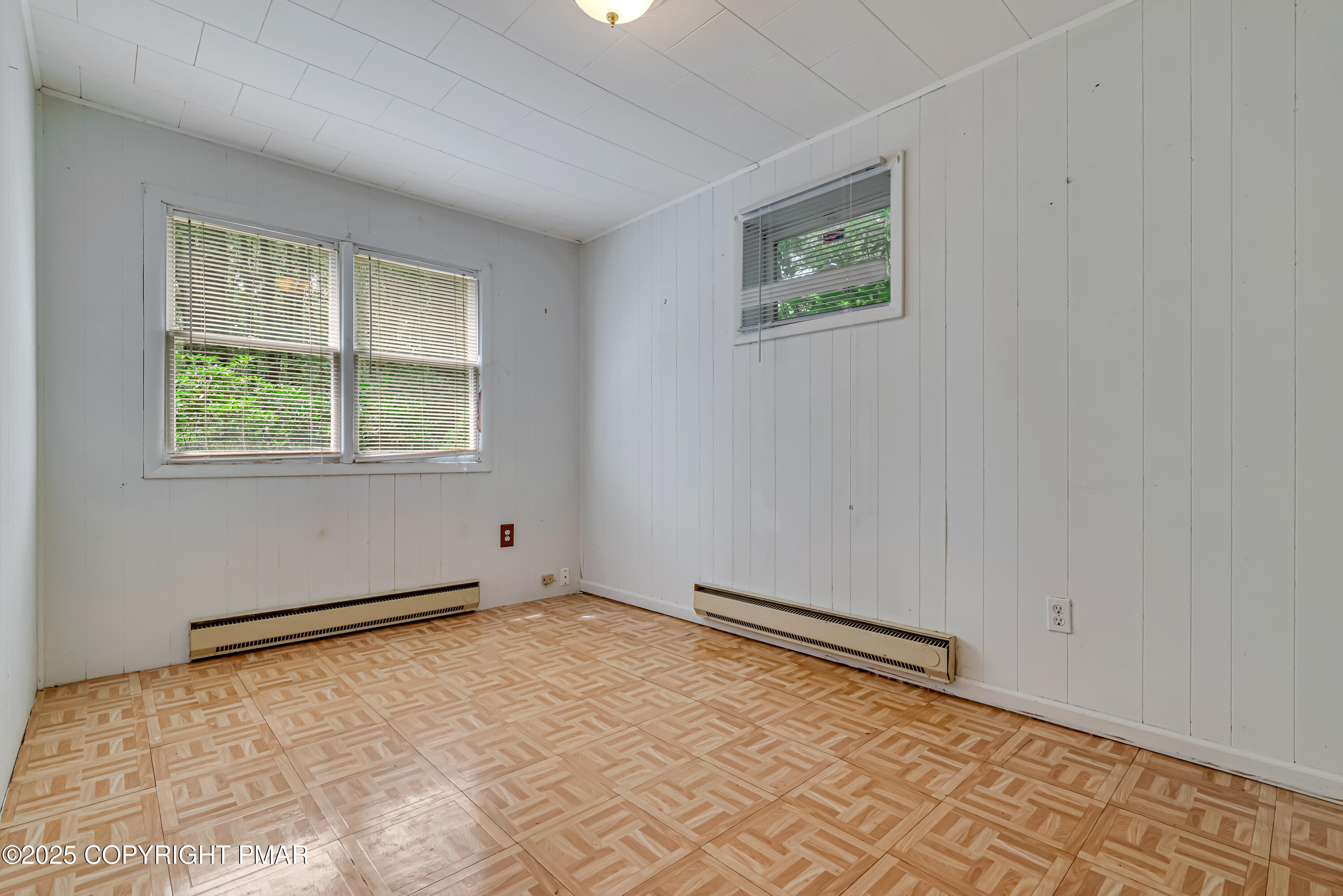 129 Winona Road Mount Pocono, PA 18344 - Photo 40 of 64 a view of an empty room with a window