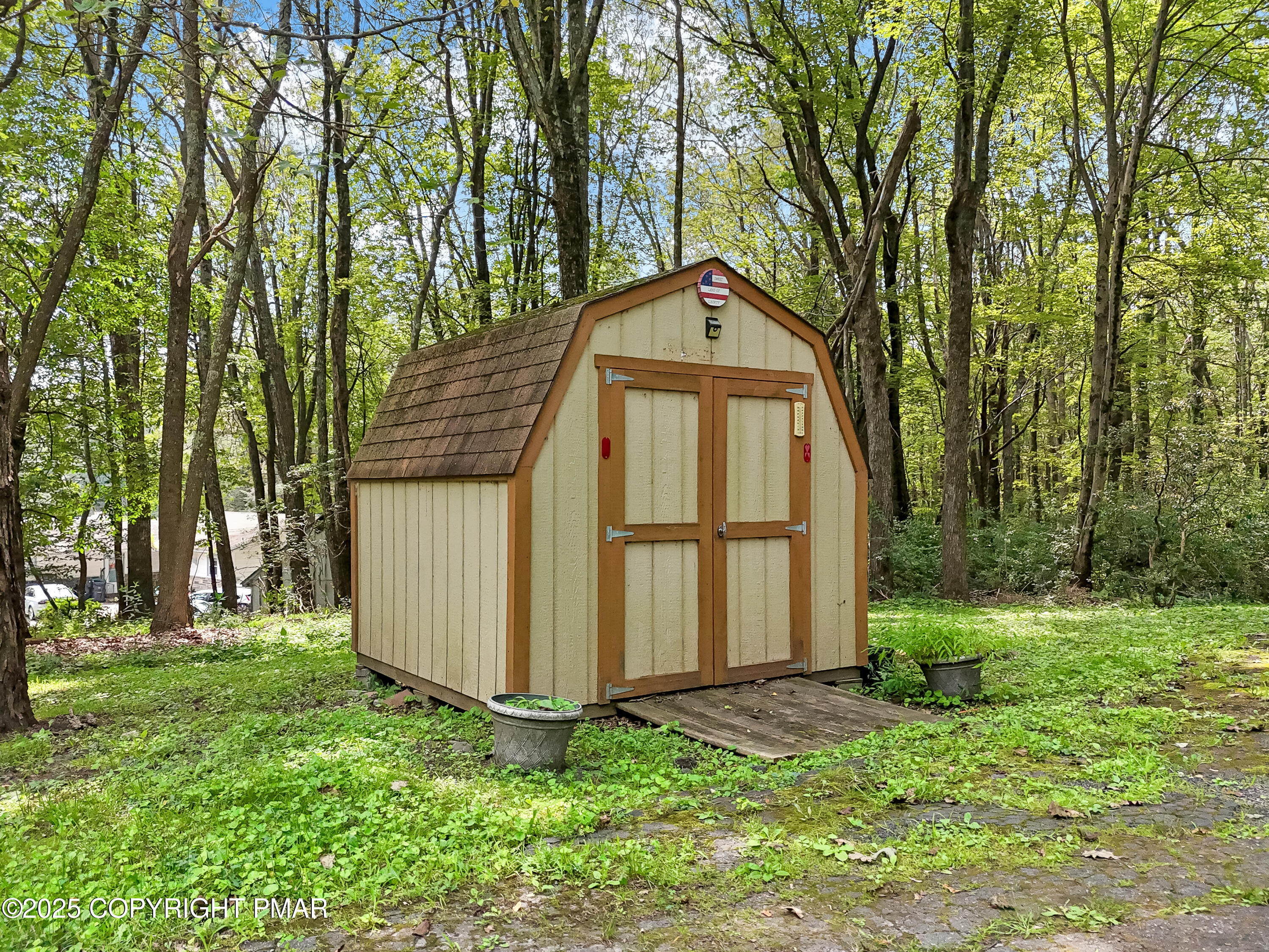 129 Winona Road Mount Pocono, PA 18344 - Photo 52 of 64 a view of backyard of house with green space