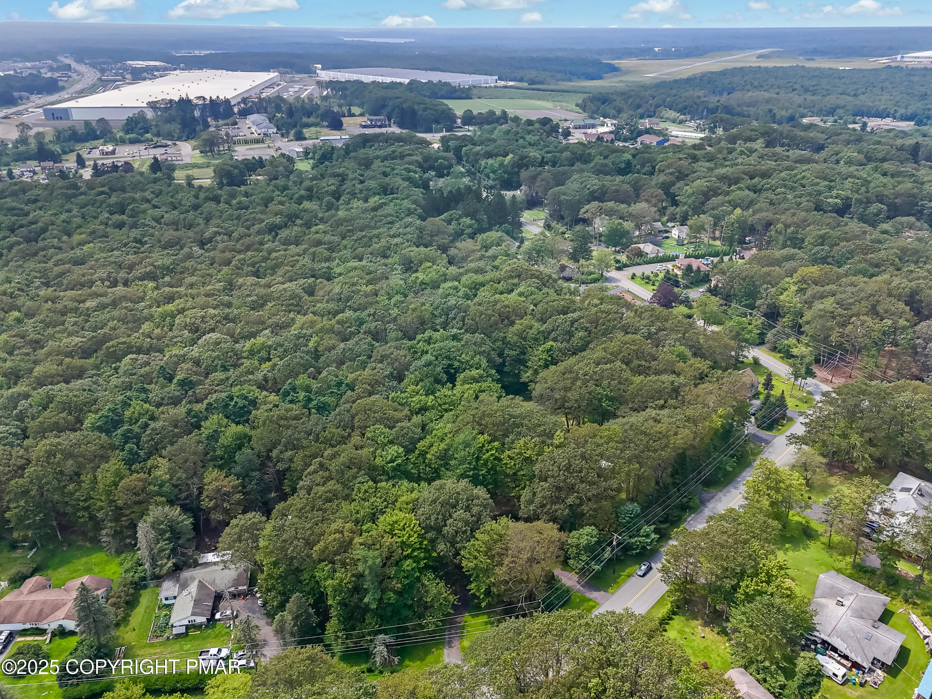 129 Winona Road Mount Pocono, PA 18344 - Photo 63 of 64 an aerial view of a city with lots of residential buildings
