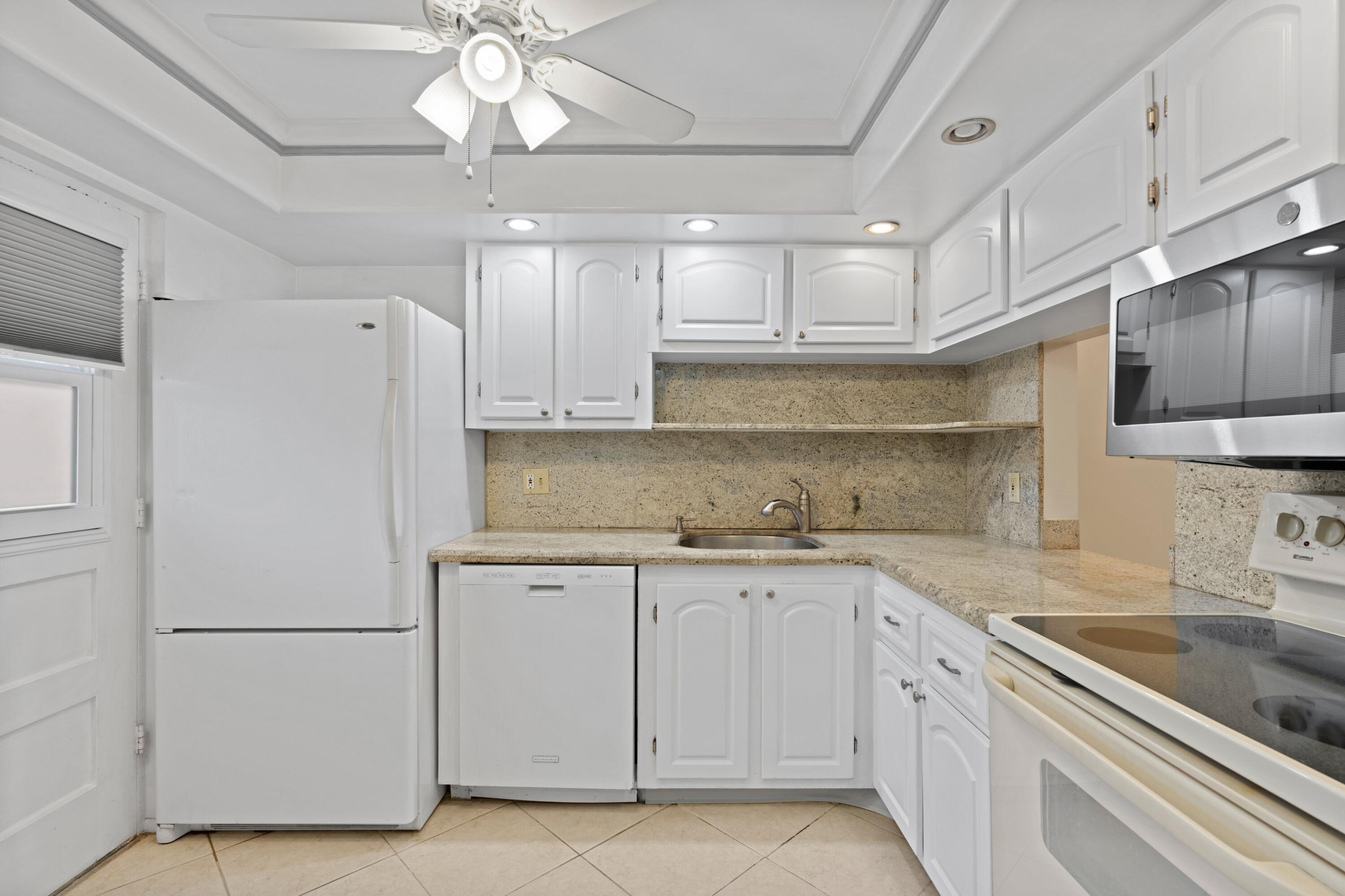 5961 Northwest 2nd Avenue, Unit 209 Boca Raton, FL 33487 - Photo 8 of 35 Kitchen