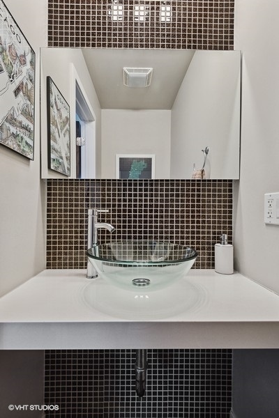 1745 North Troy Street Chicago, IL 60647 - Photo 20 of 29 a bathroom with a sink and a shower
