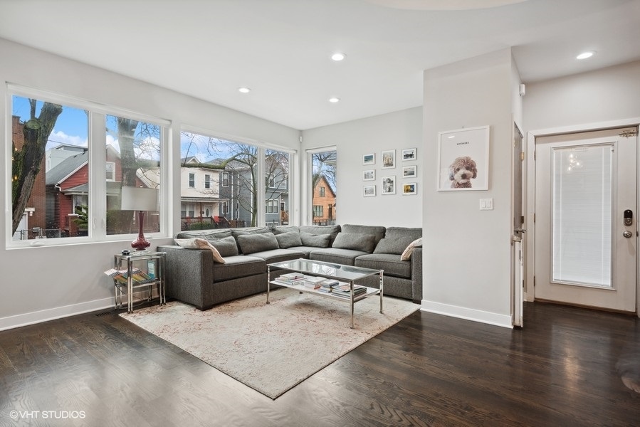 1745 North Troy Street Chicago, IL 60647 - Photo 2 of 29 a living room with furniture window and wooden floor