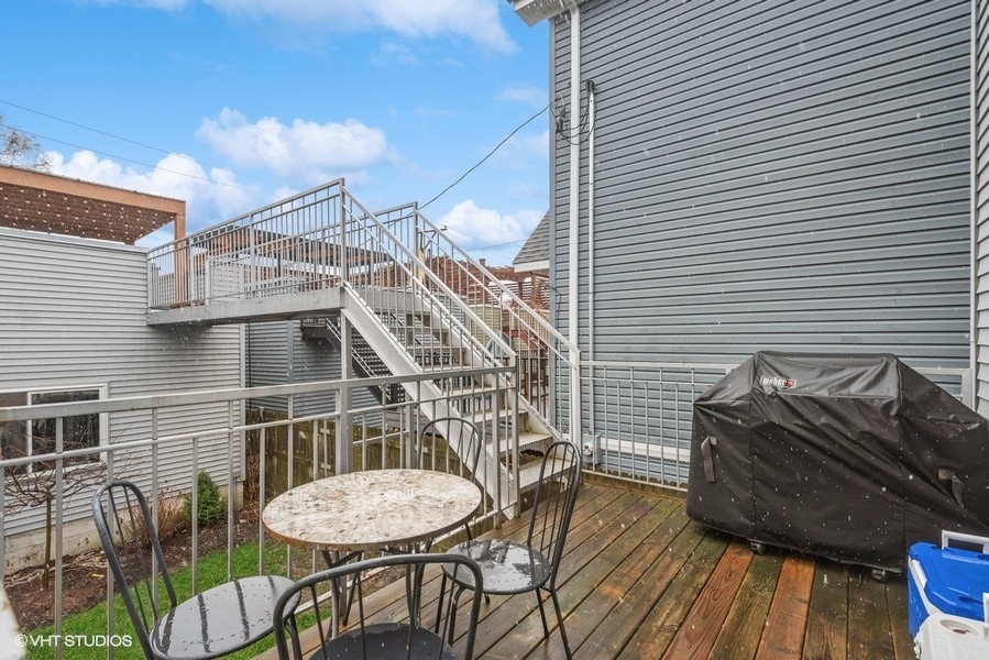 1745 North Troy Street Chicago, IL 60647 - Photo 21 of 29 a view of a chairs and table in the patio