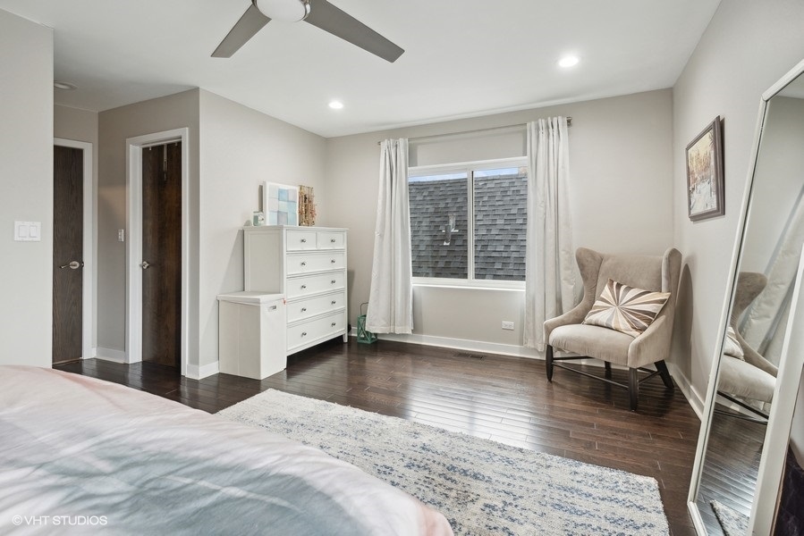 1745 North Troy Street Chicago, IL 60647 - Photo 10 of 29 a bedroom with furniture and a window
