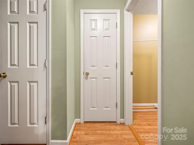a view of a bathroom with a glass door