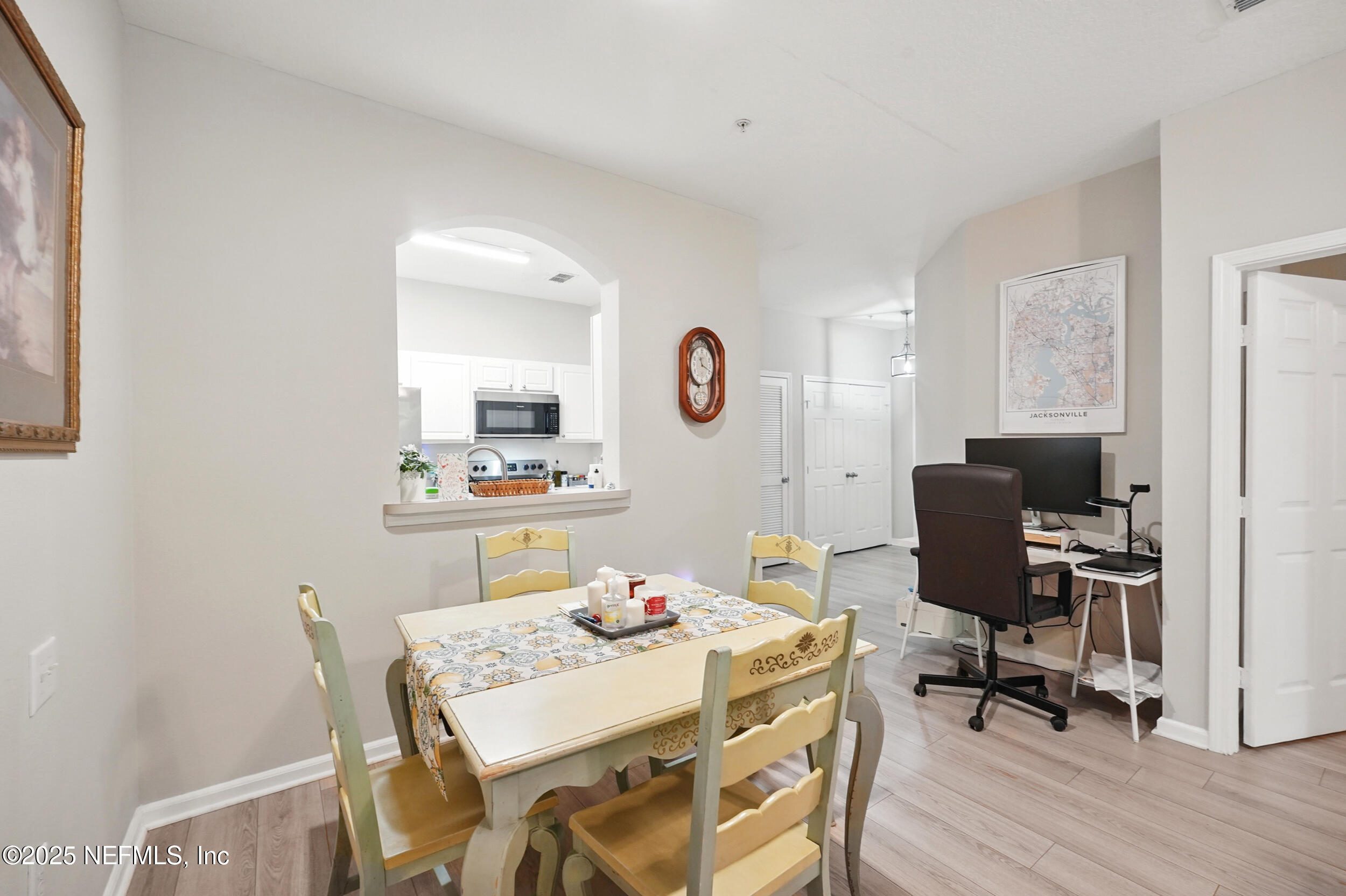10550 Baymeadows Road, Unit 203 Jacksonville, FL 32256 - Photo 6 of 25 Living Room to Kitchen