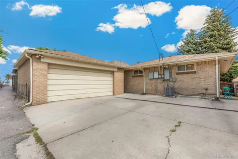 a view of a house with a garage