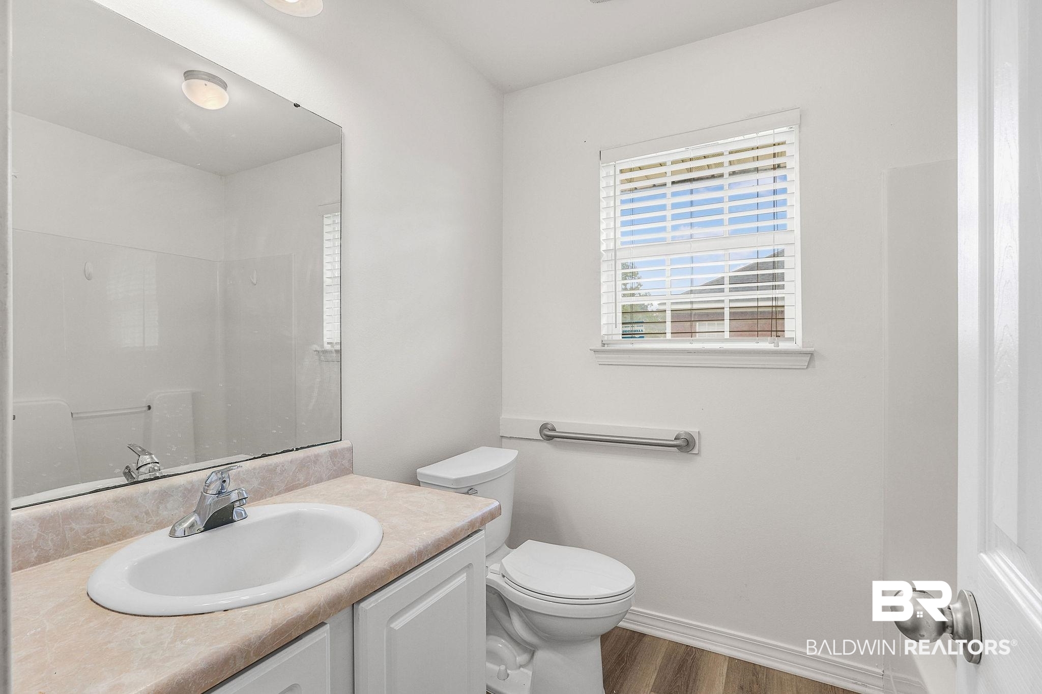 18620 Hammond Street Robertsdale, AL 36567 - Photo 13 of 23 Bathroom with vanity, toilet, wood-type flooring, and walk in shower