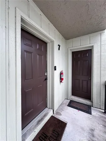 a view of elevator with hallway