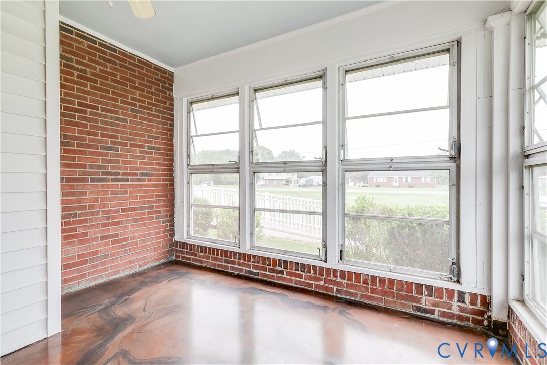 12365 Ashcake Road Ashland, VA 23005 - Photo 3 of 80 Sunroom with finished concrete flooring and louver