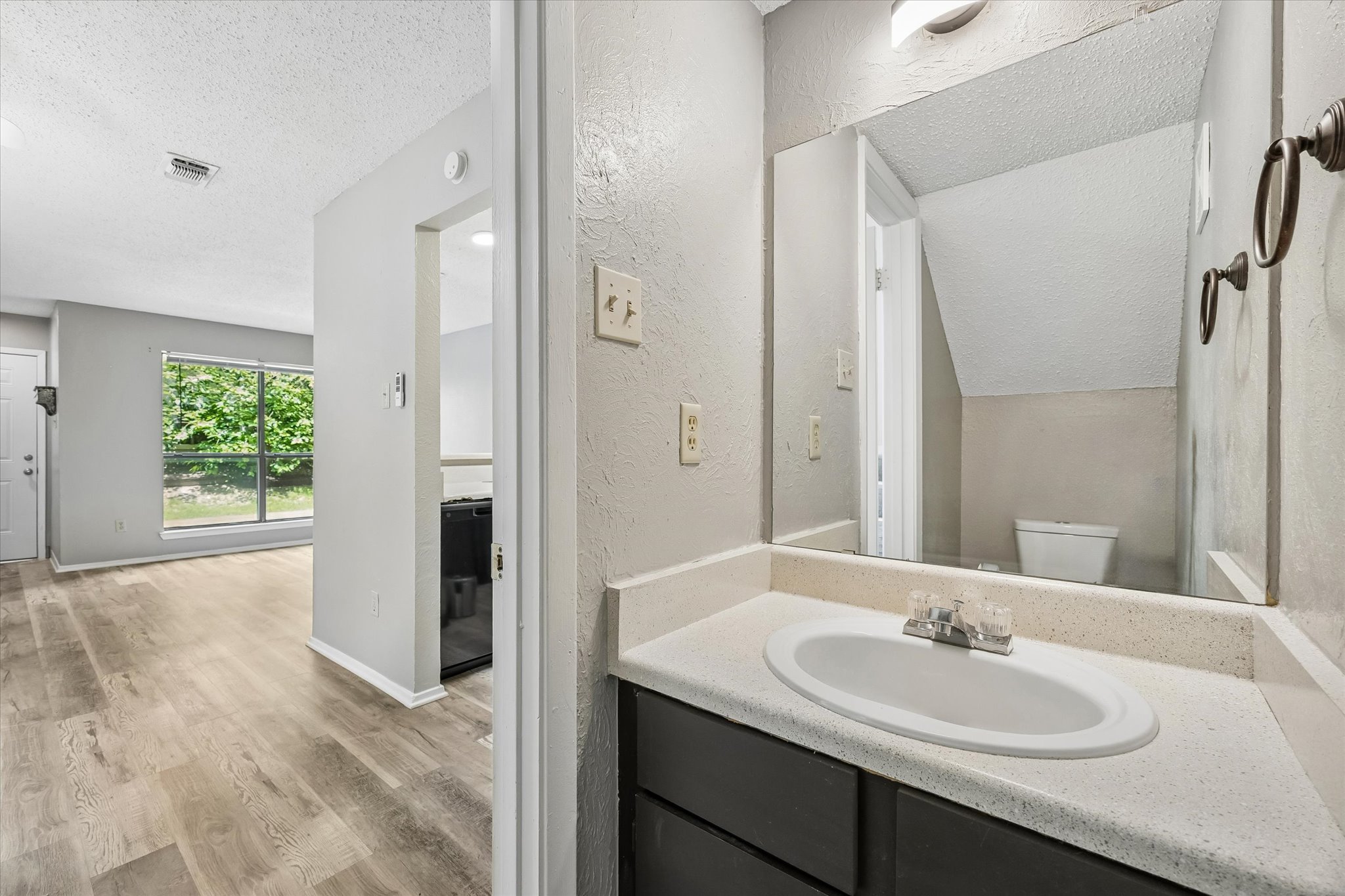 2018 West Rundberg Lane, Unit 13A Austin, TX 78758 - Photo 6 of 11 a bathroom with a sink double vanity granite tub and shower