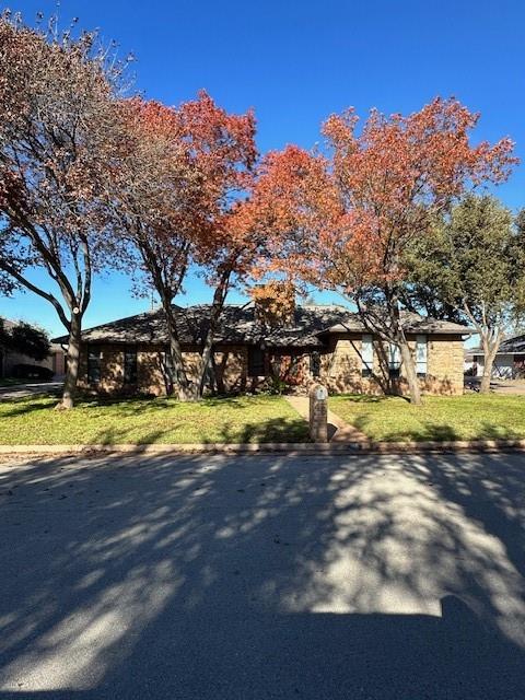 46 Augusta Drive Abilene, TX 79606 - Photo 1 of 1 a view of a swimming pool with an outdoor space and seating area