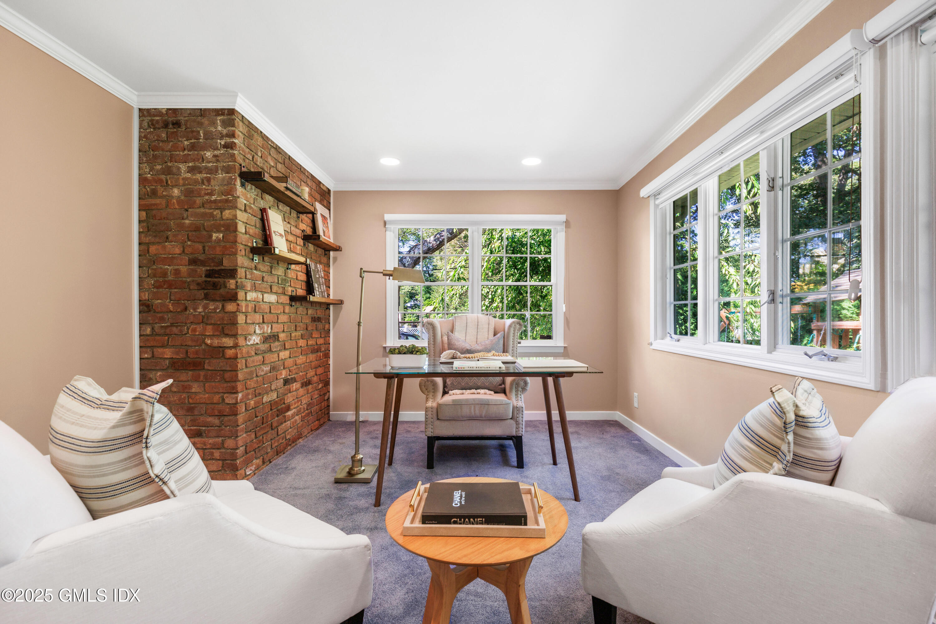 44 Bote Road Greenwich, CT 06830 - Photo 11 of 30 a living room with furniture and a large window