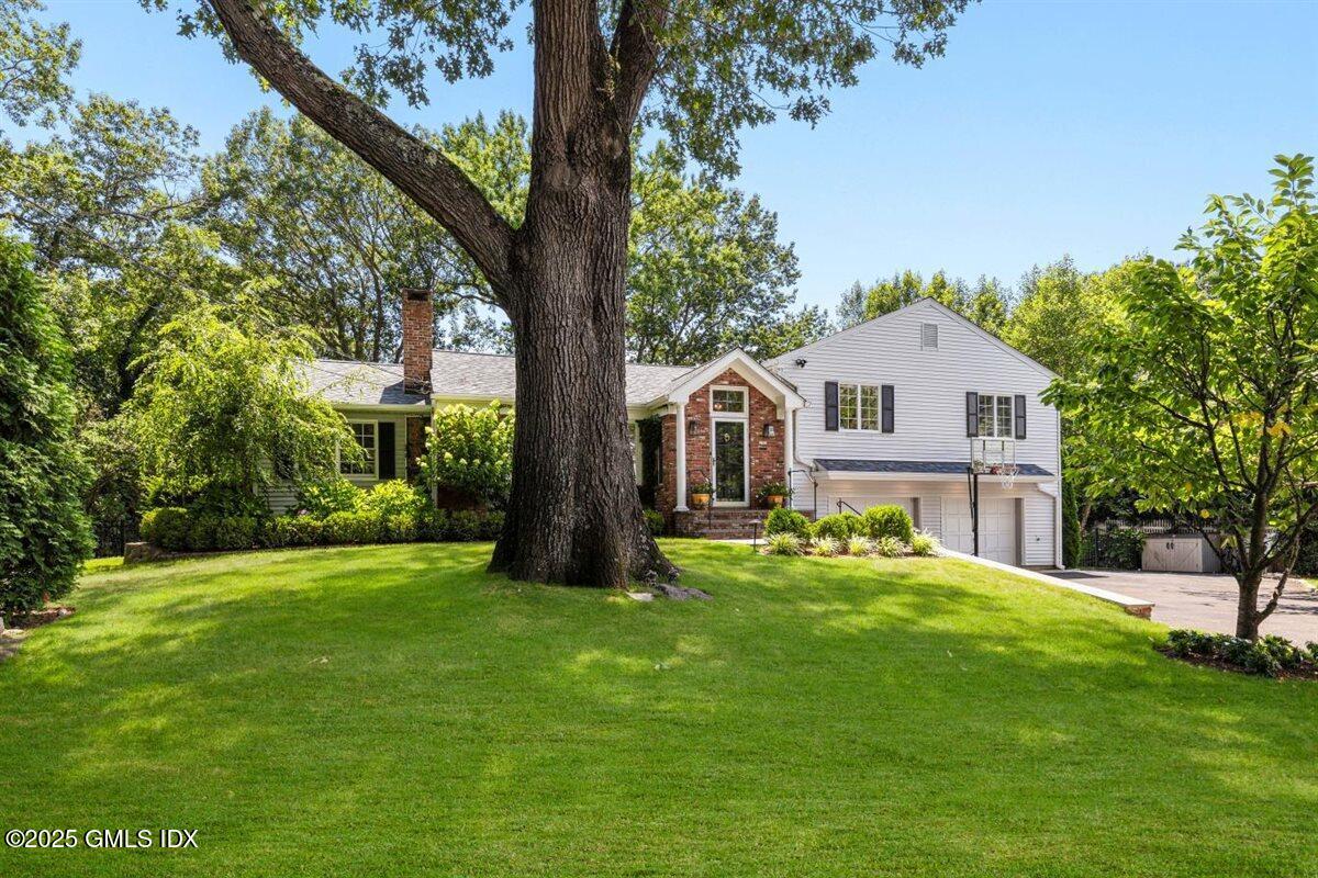 44 Bote Road Greenwich, CT 06830 - Photo 2 of 30 a view of a house with a yard