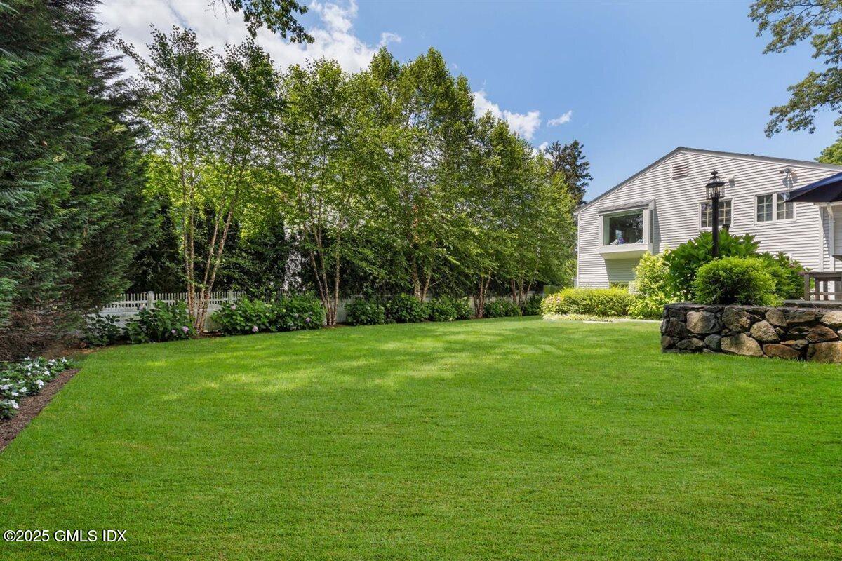 44 Bote Road Greenwich, CT 06830 - Photo 23 of 30 a view of a house with a garden