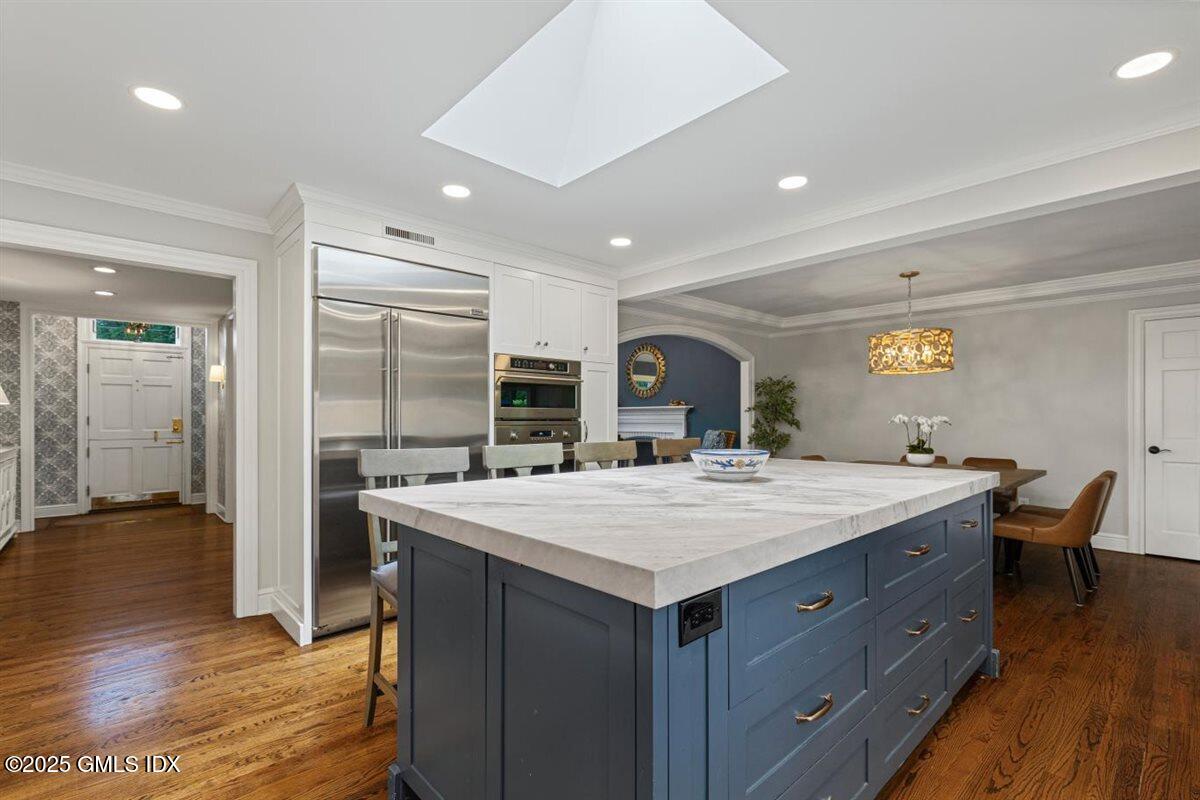 44 Bote Road Greenwich, CT 06830 - Photo 4 of 30 a view of living room kitchen island with wooden floor