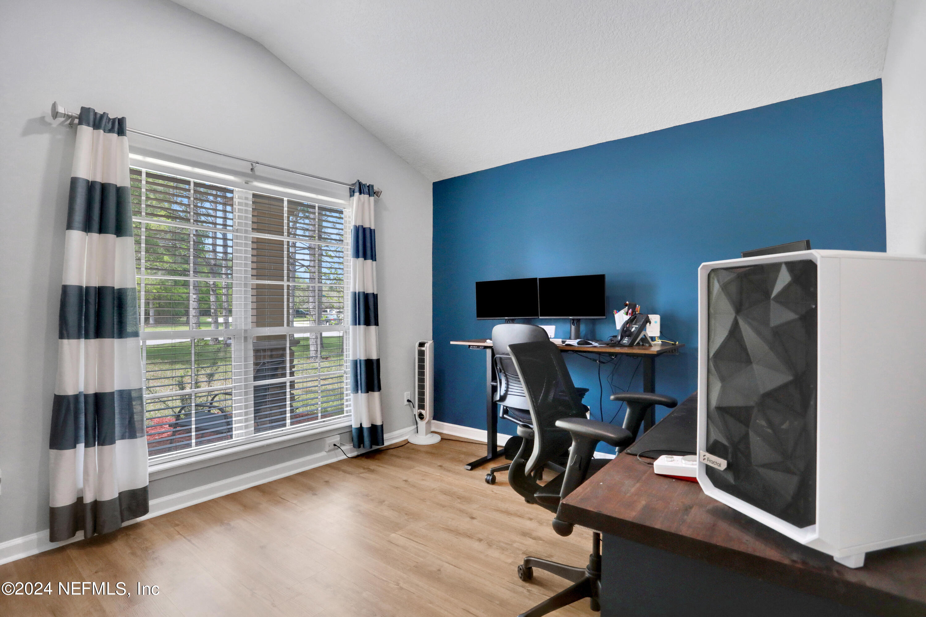 2000 Spring Meadows Court St. Augustine, FL 32092 - Photo 8 of 40 a workspace with furniture and a window