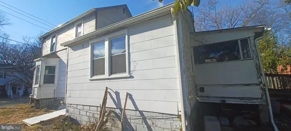 a view of swimming pool with a patio